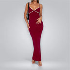Red dress with thin straps on a gray background